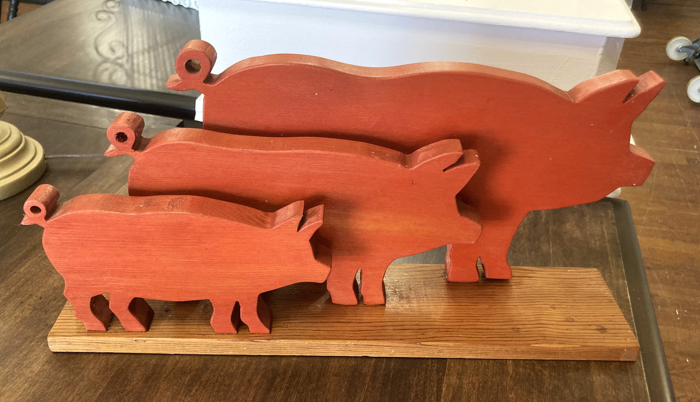Three Wooden Pigs